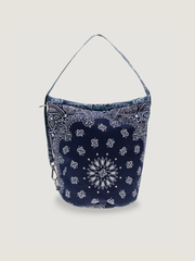 Navy bucket bag with white bandana print and adjustable shoulder strap
