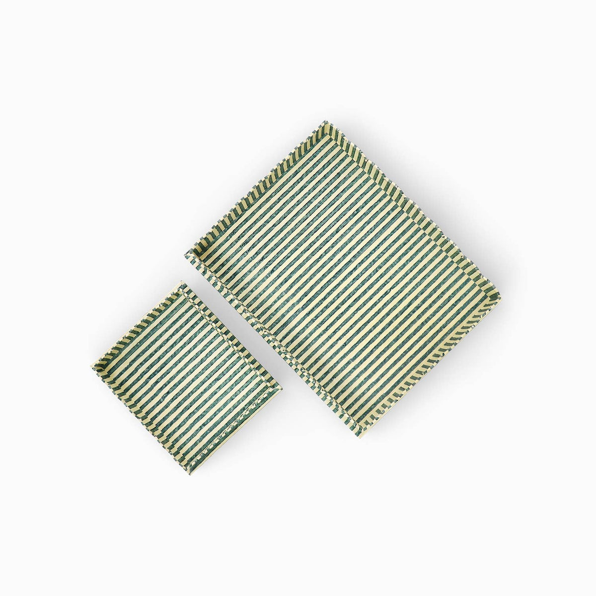Large scalloped serving tray with striped green and white pattern, plus small matching tray.
