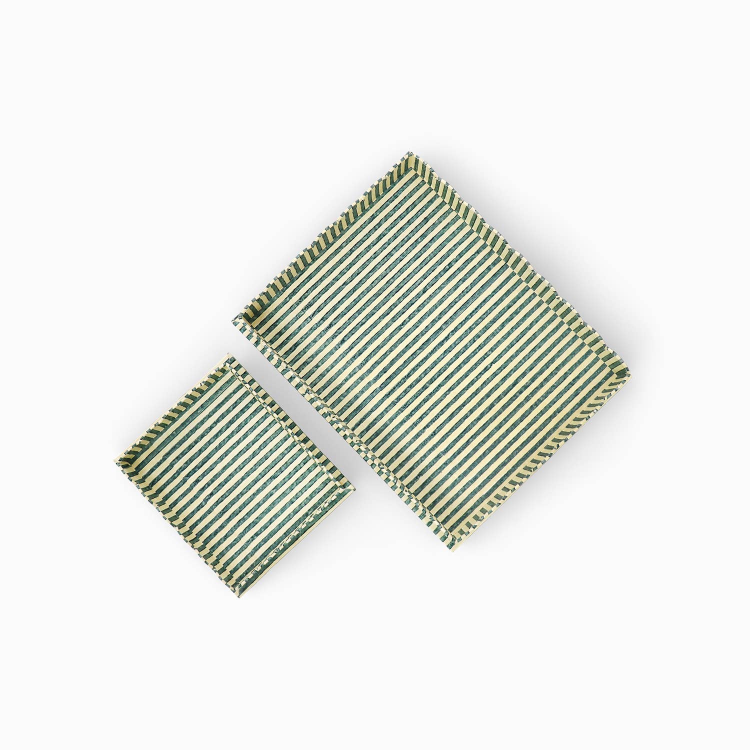 Large scalloped serving tray with striped green and white pattern, plus small matching tray.