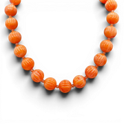 Coral orange carved resin bead necklace with round melon-style beads