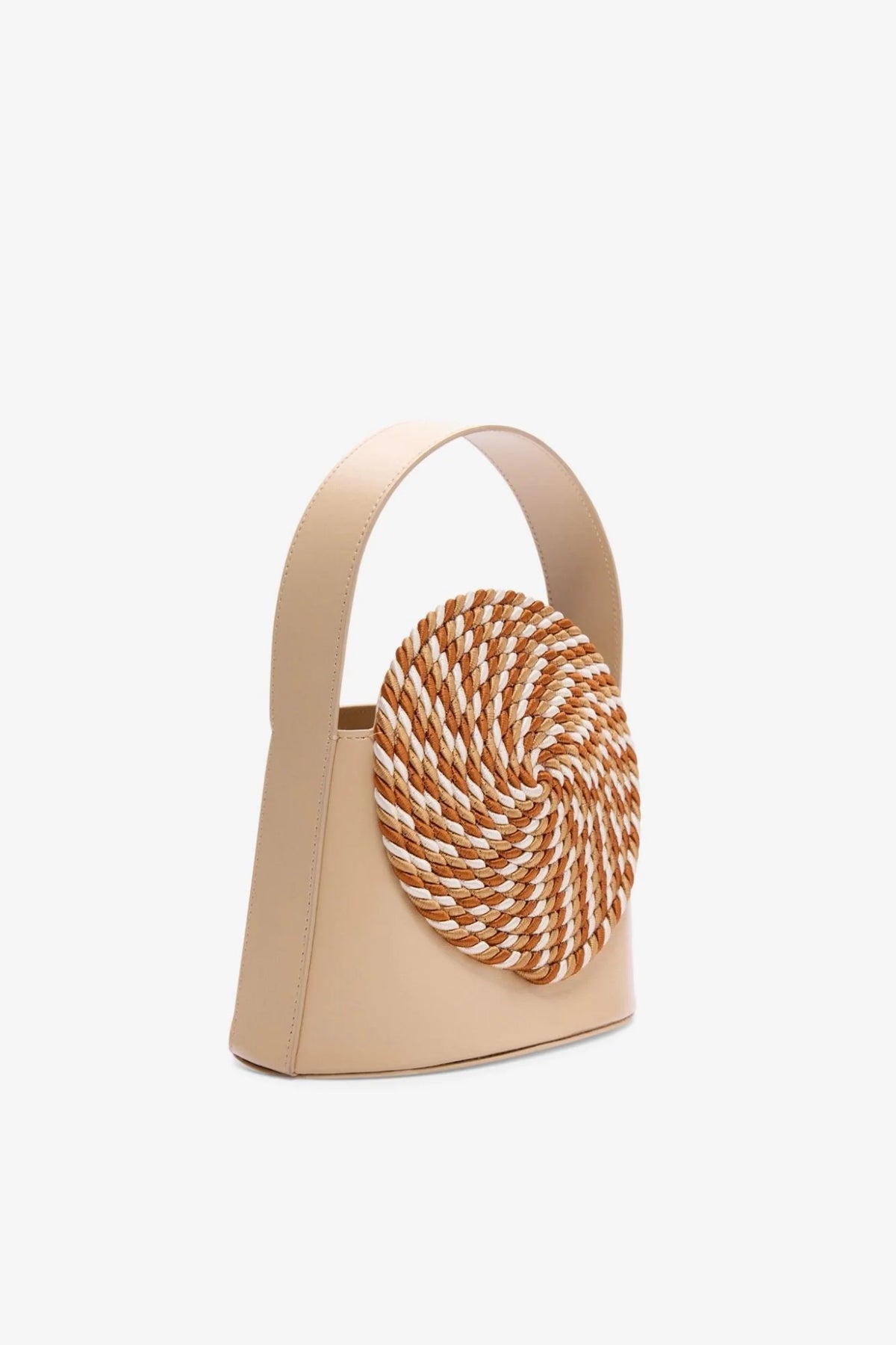 Beige tote bag with loop handle and side view of round woven rattan patch