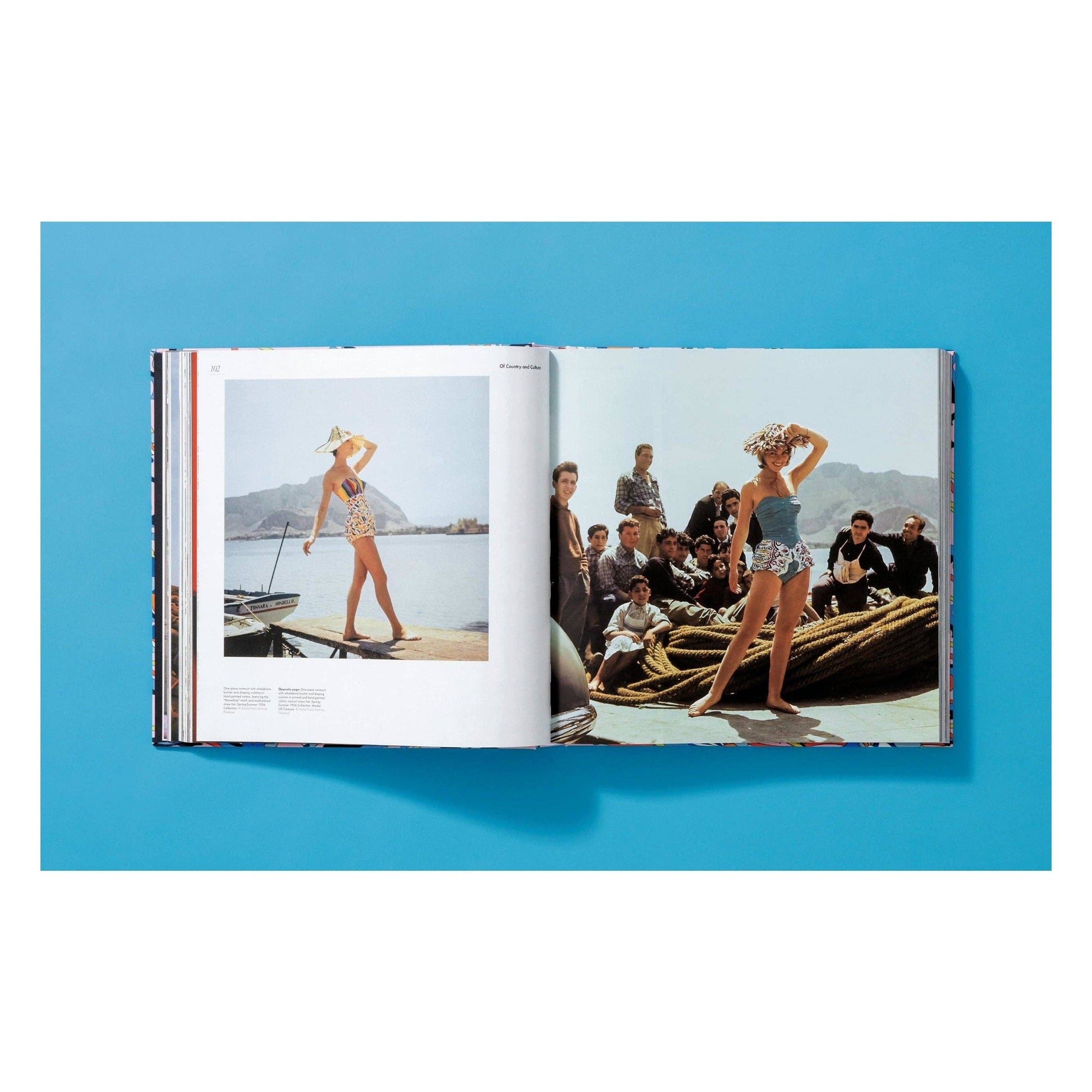 Pucci fashion book open to interior pages with beach fashion photo and group scene.