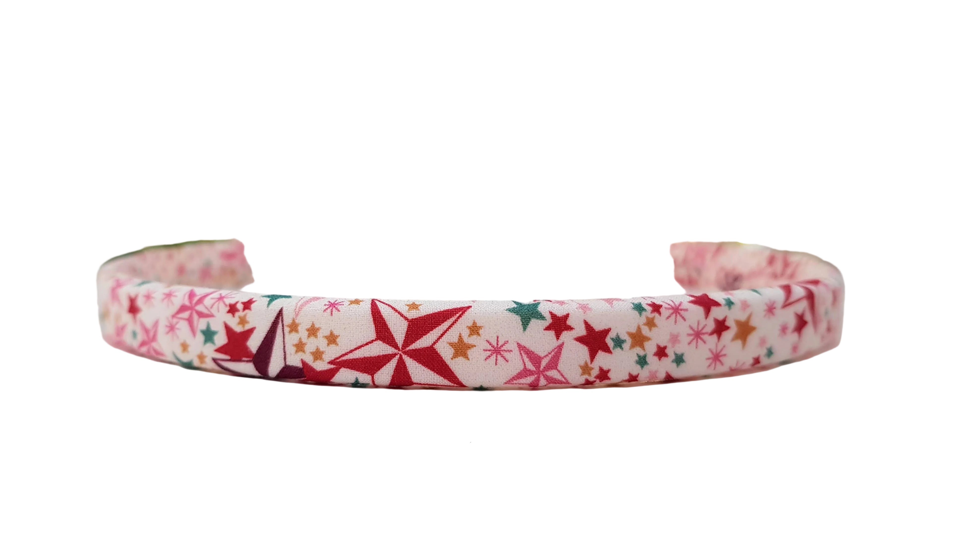 Star-pattern headband in red, white, green, and gold