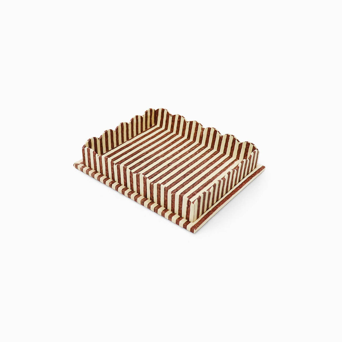 Brown and cream striped scalloped serving tray with raised zigzag sides and flat base