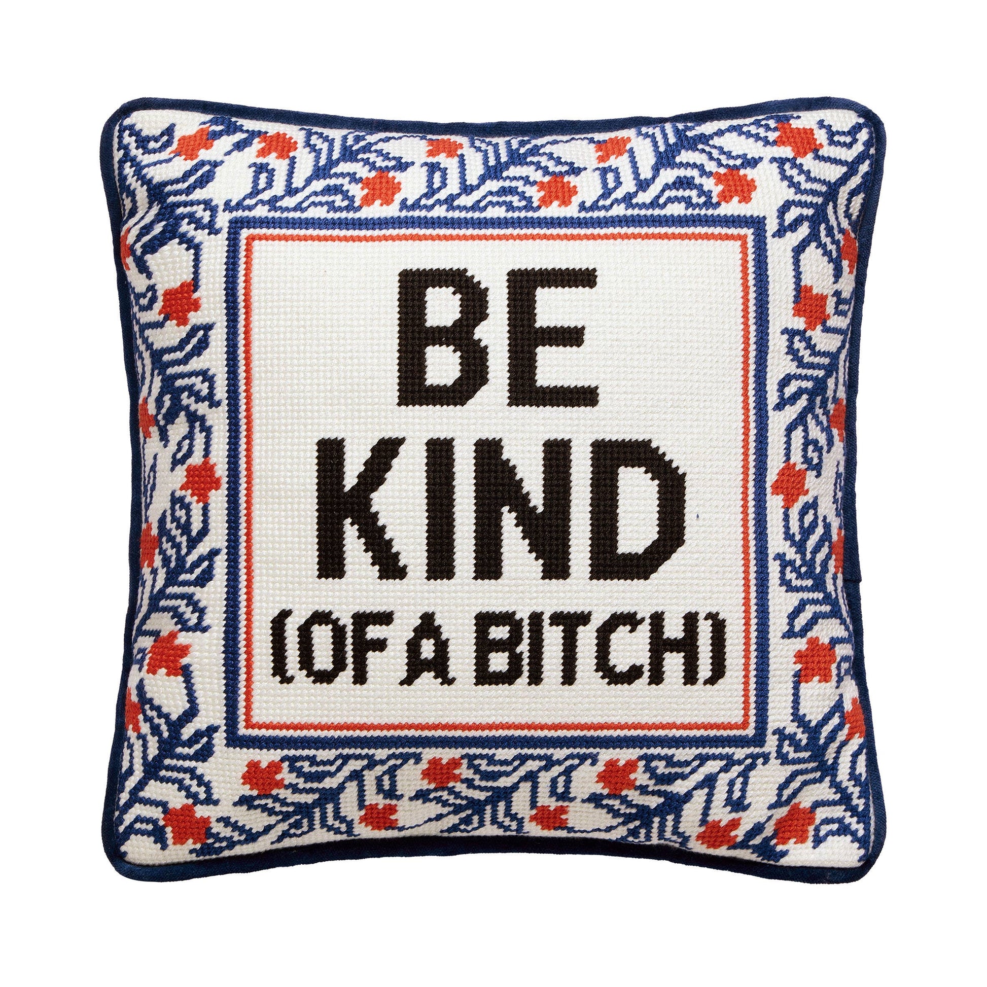 Embroidered pillow with navy border and "BE KIND (OF A BITCH)" lettering