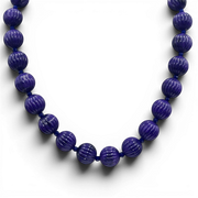 Purple carved melon bead necklace with round stacked beads