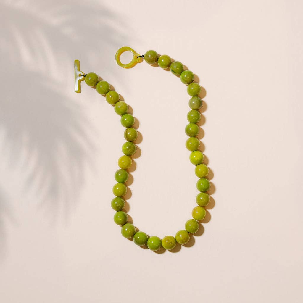 Green beaded necklace with ring loop and T-shaped clasp