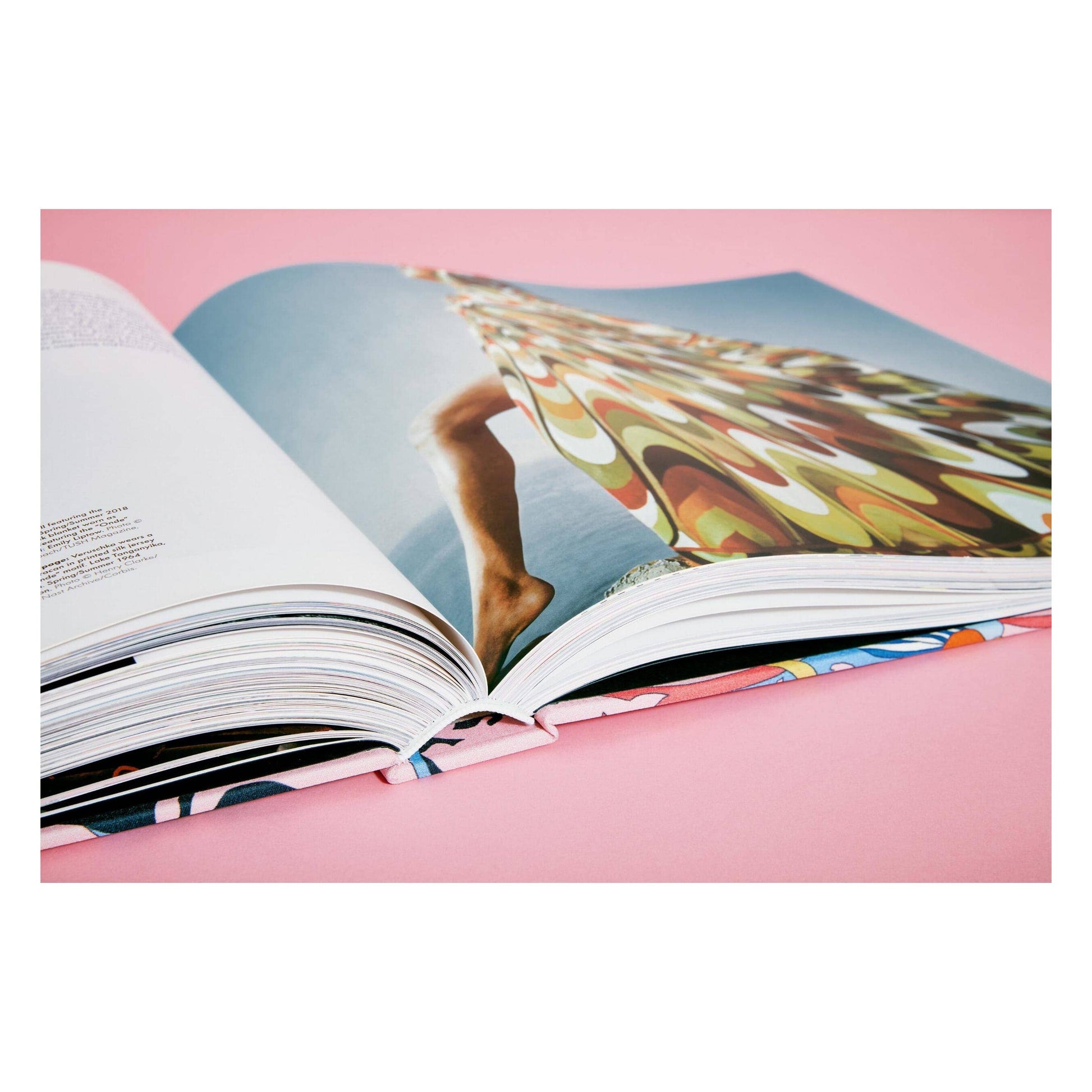Pucci updated edition book, close-up of open pages with bold fabric-style print