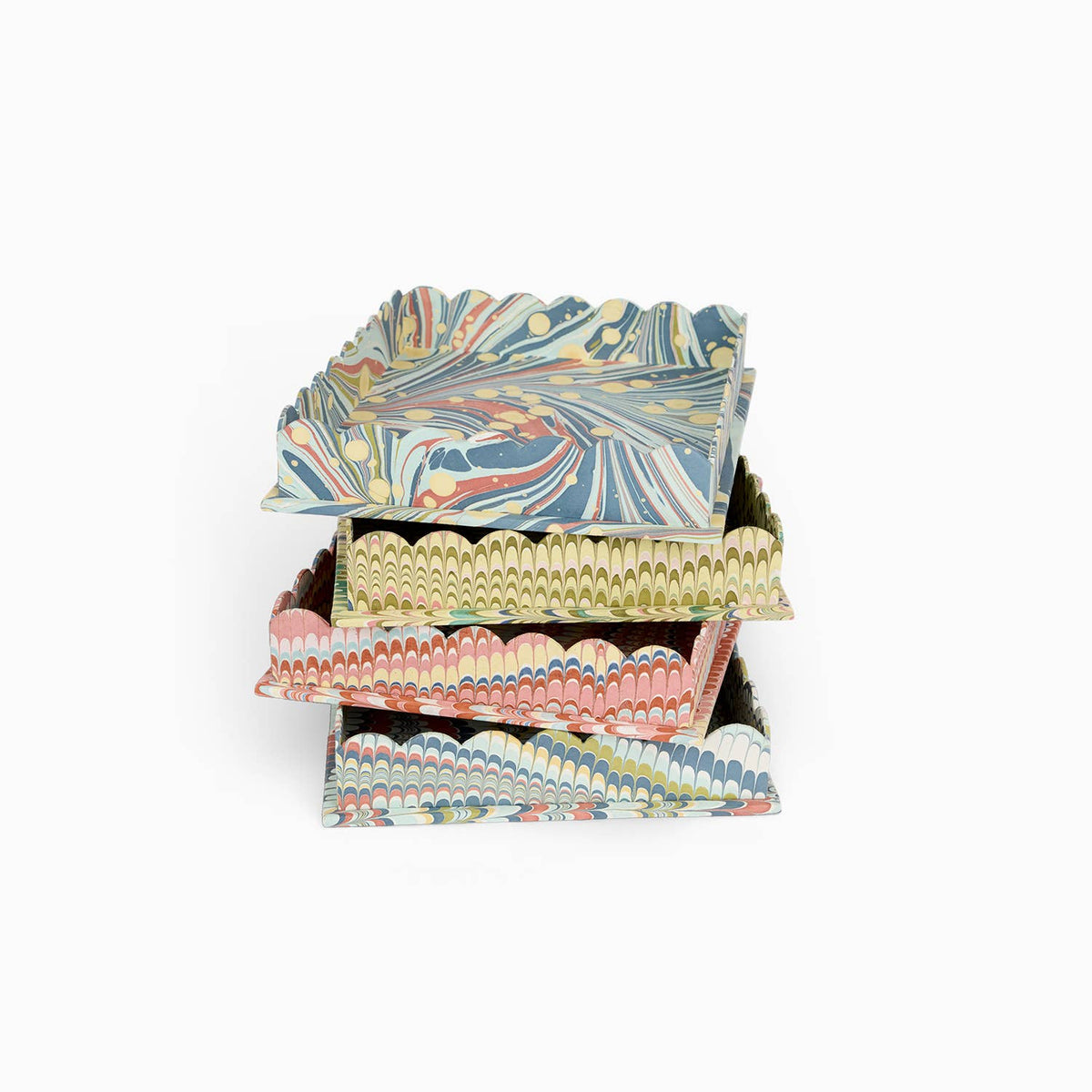 Large scalloped desk tray with colorful wave pattern, shown stacked with other trays