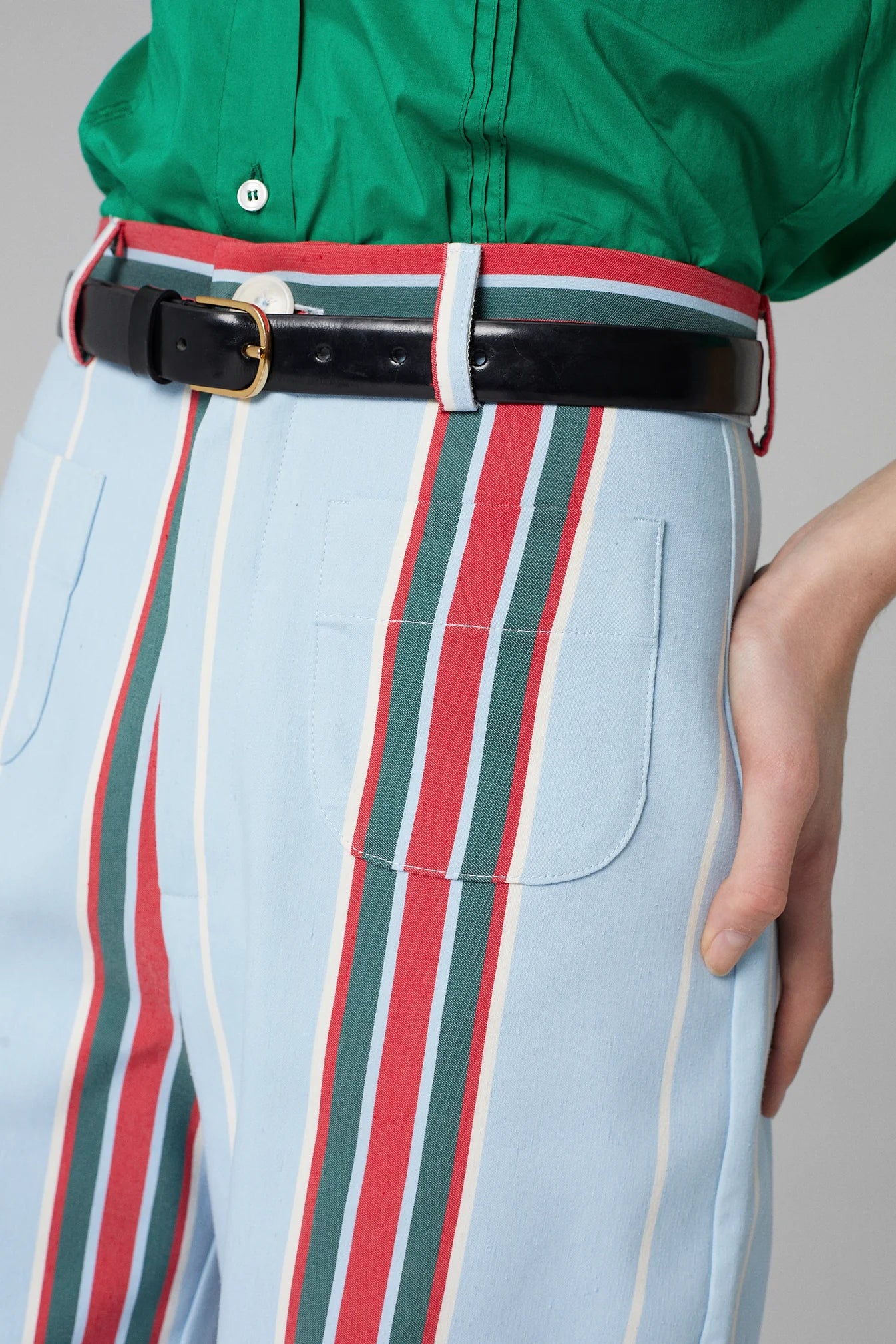 High-waisted cotton pants with belt loops, striped front, and side pocket