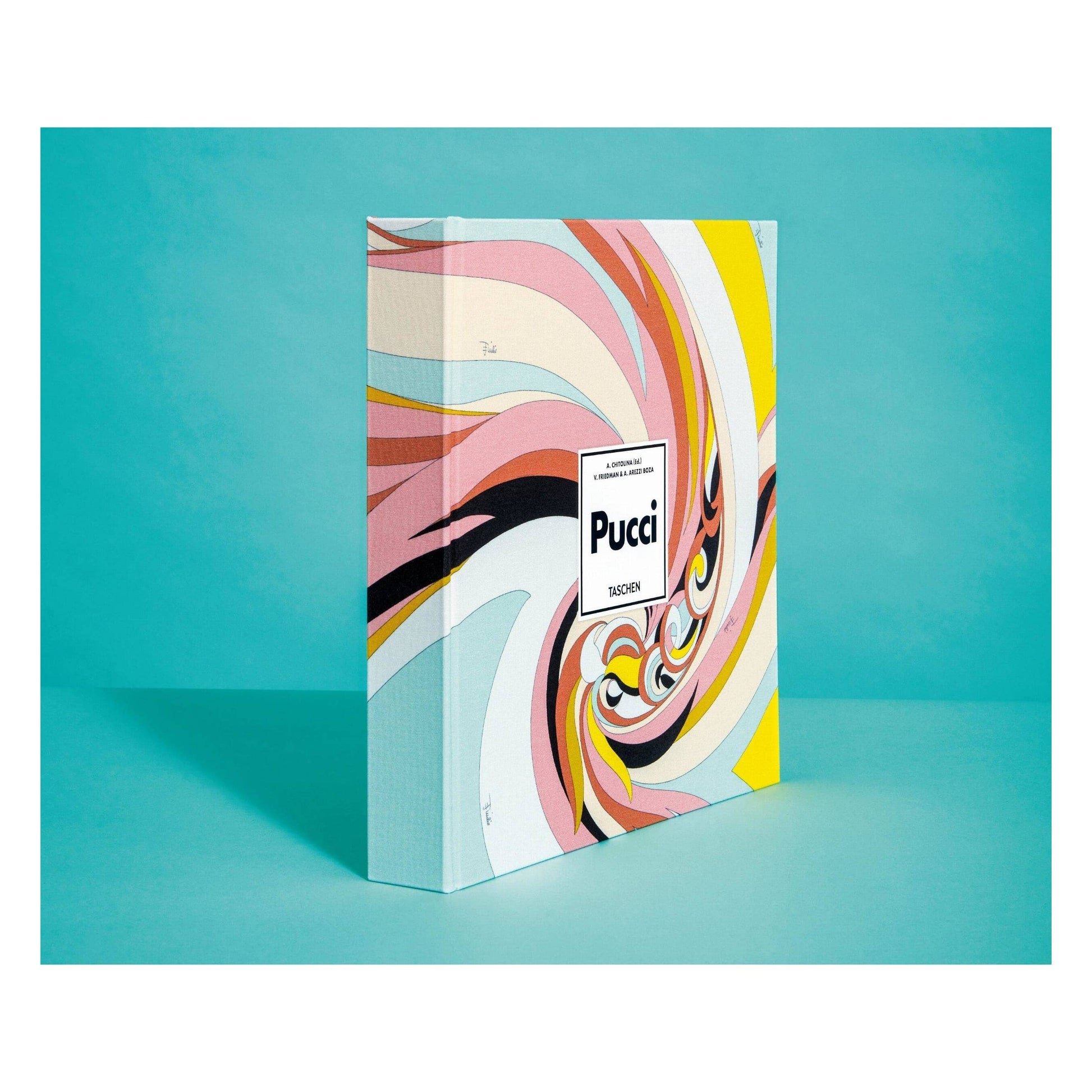 Pucci fashion book with illustrated abstract cover and visible spine edge.