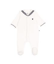 White velour baby footie with sailor collar and short sleeves, heart chest detail.