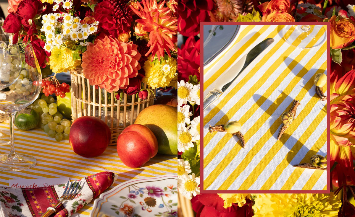 Open book spread with a floral scene photo and an inset photo of striped table decor