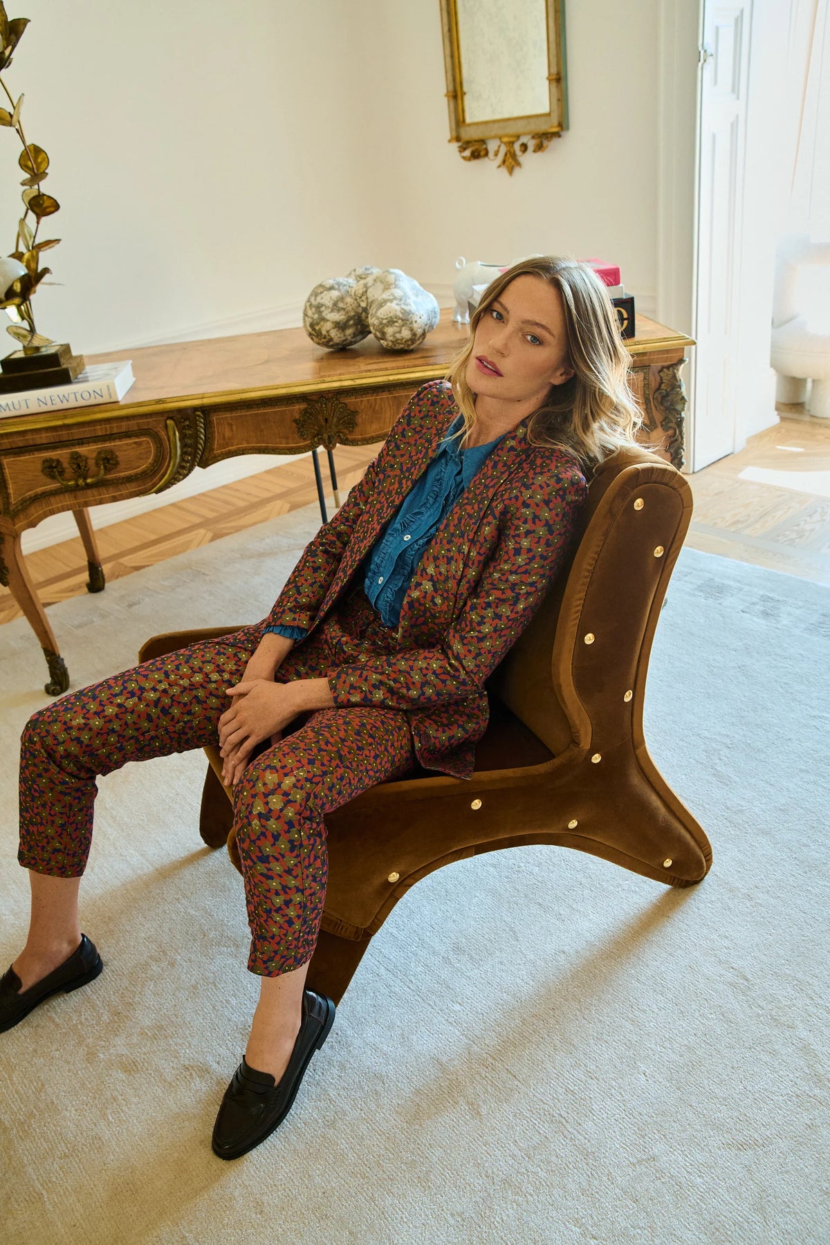 Multicolor confetti print blazer with notched lapels and long sleeves, worn by model