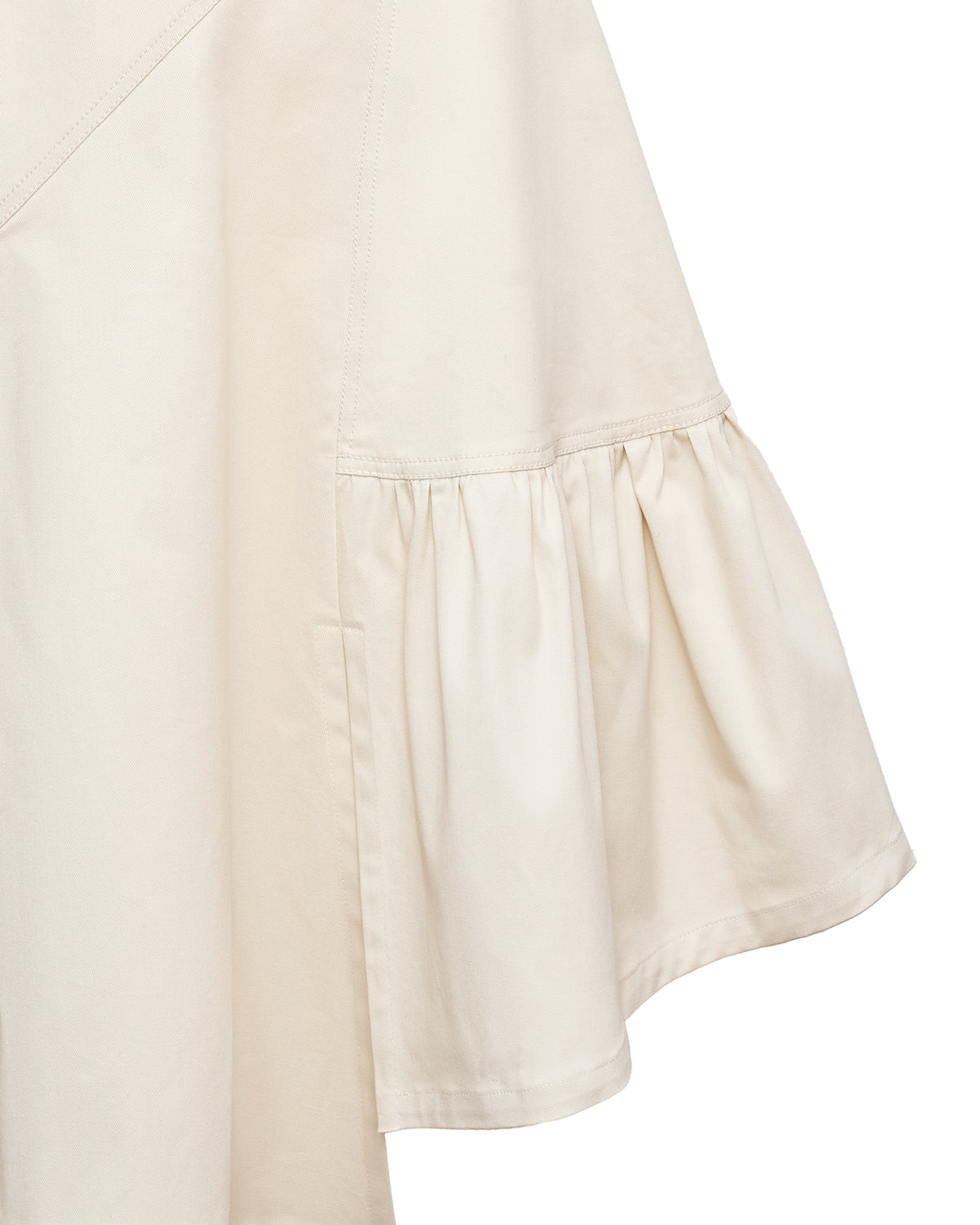 Freya gabardine skirt close-up, off-white tiered ruffle hem with gathered band