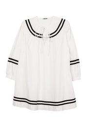 White sailor dress with black striped collar and cuffs, tie neckline, 3/4 sleeves