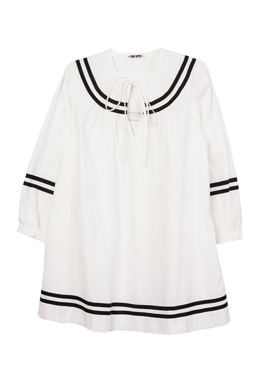 White sailor dress with black striped collar and cuffs, tie neckline, 3/4 sleeves