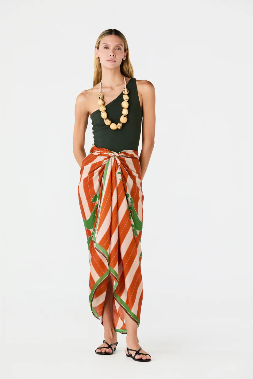 Cotton-silk sarong worn tied at the waist, orange and white stripes with green print