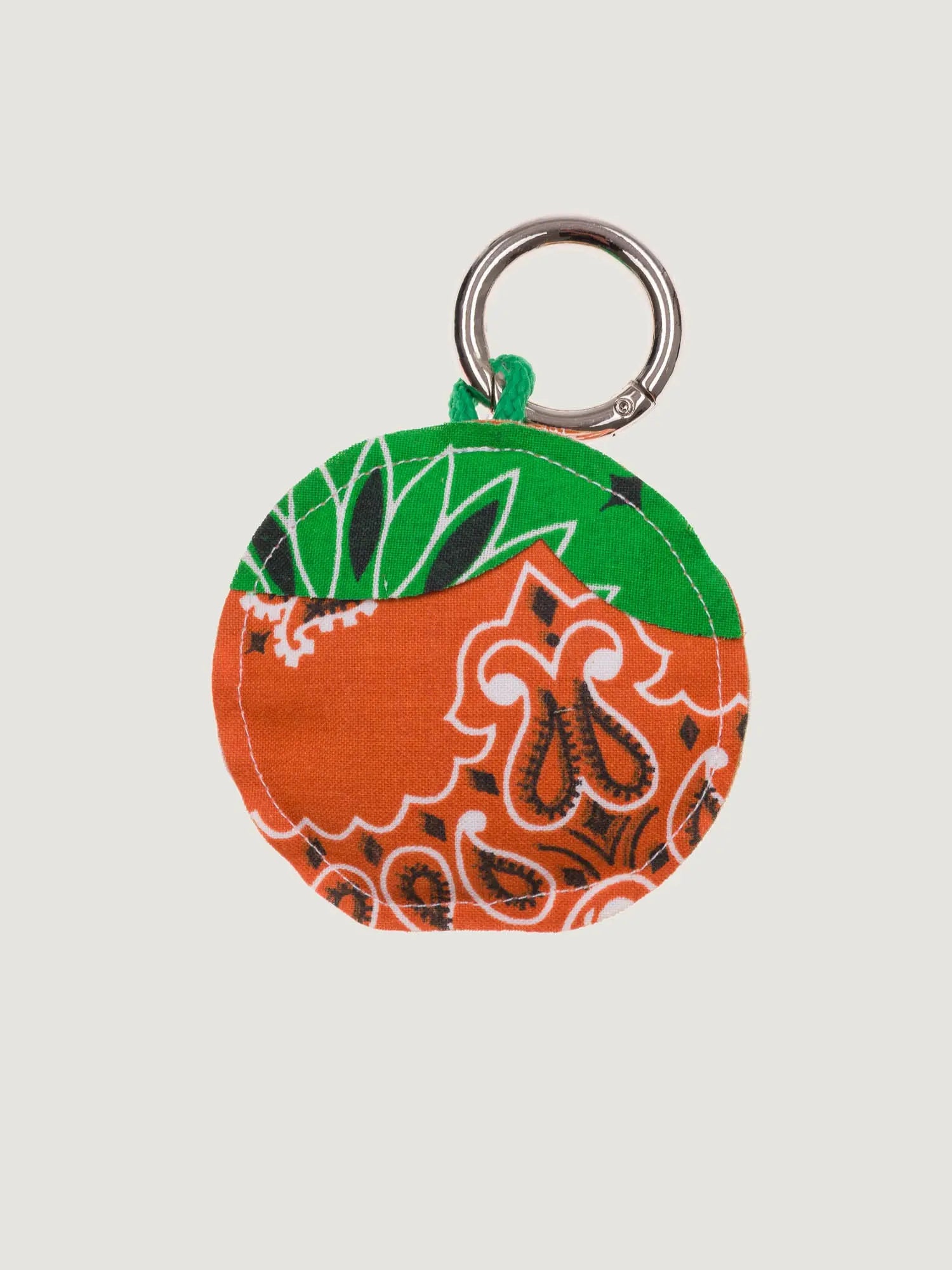 Clementine round fabric key ring with orange pattern and green leaf top, metal loop