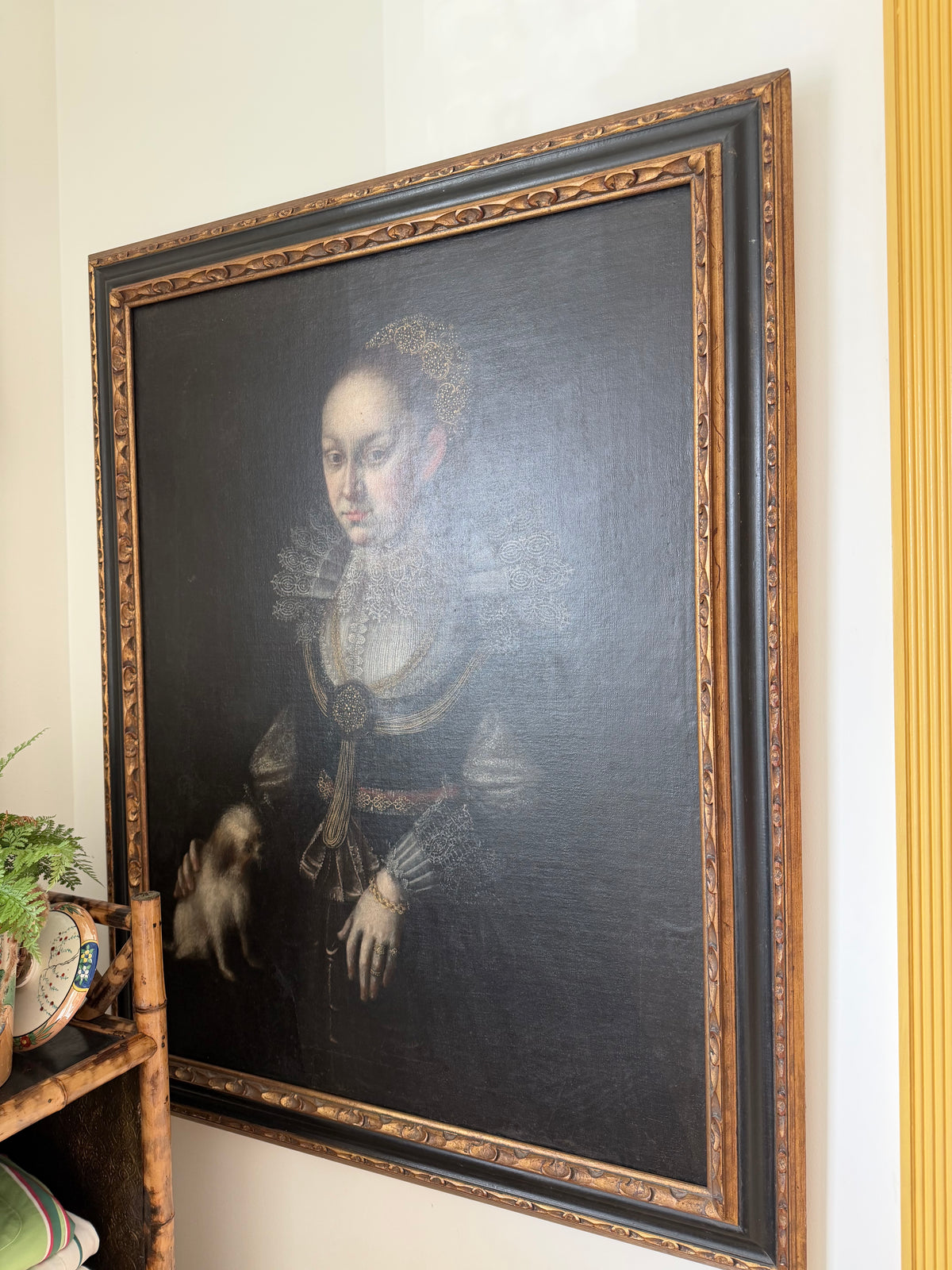 Framed portrait of a noblewoman in lace ruff with dark embroidered dress