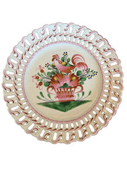 Reticulated faience plate with rooster and floral medallion