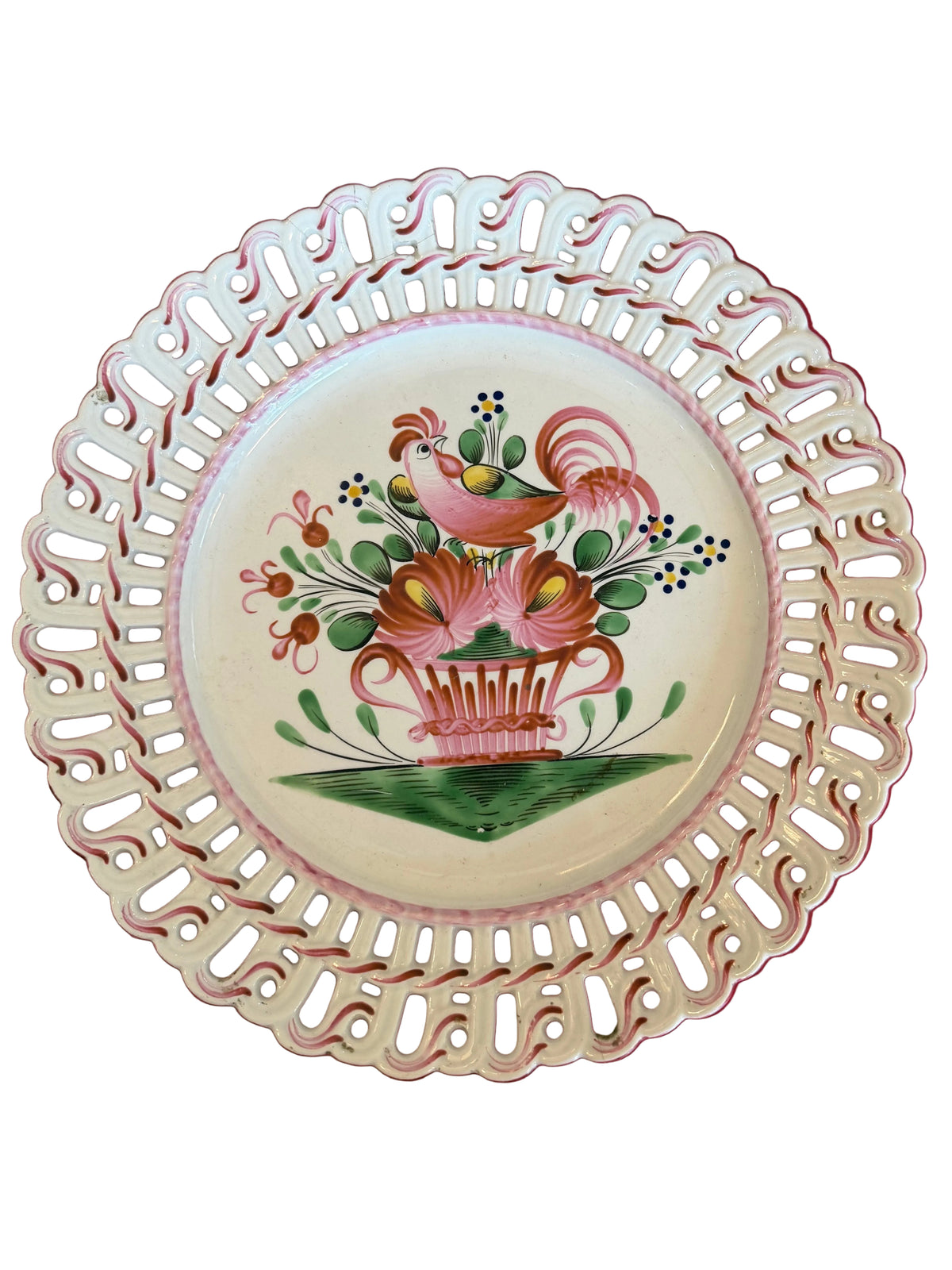 Reticulated faience plate with rooster and floral medallion