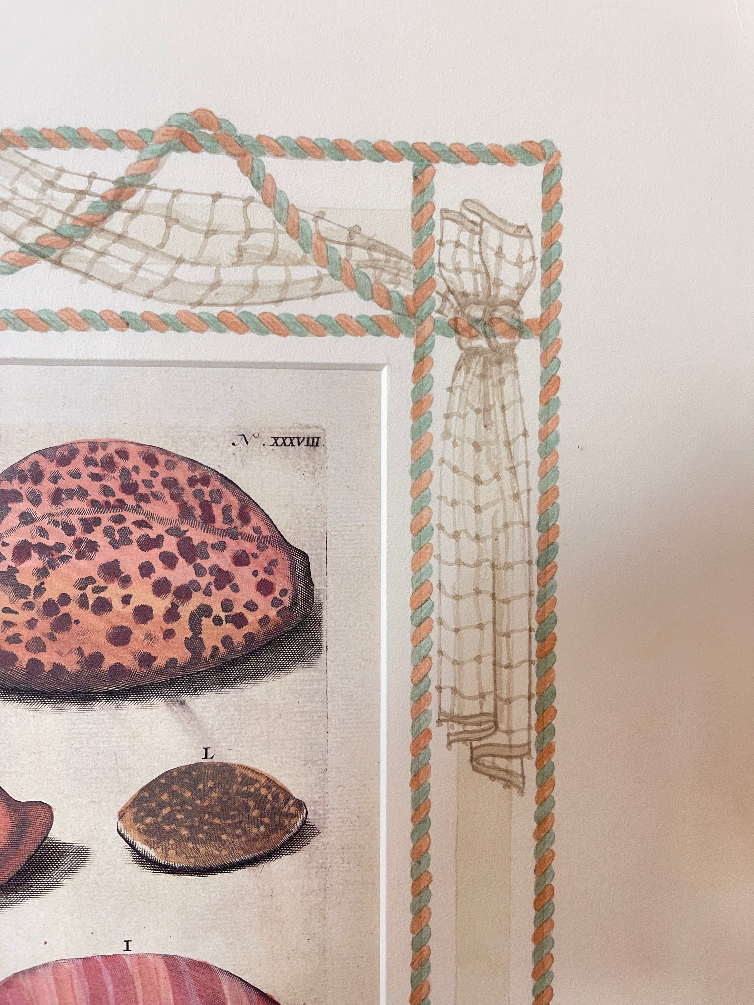 Close view of shell artwork and corner border with rope and net pattern around the print