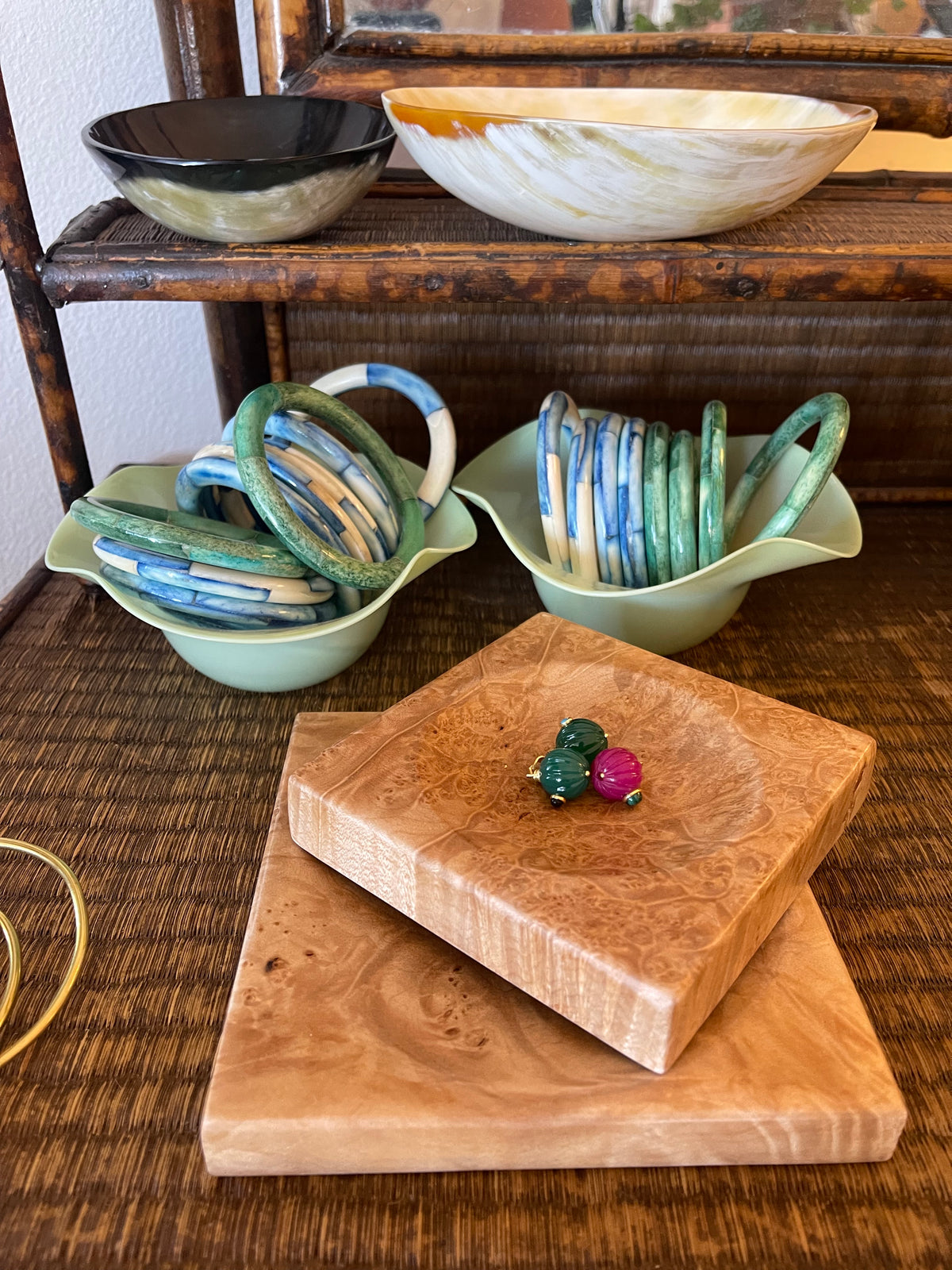 Small burlwood dish with warm brown grain and colorful bead accents on top