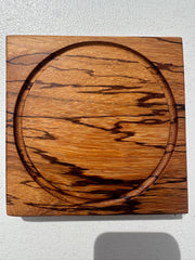 Marblewood citrus cutting board with round citrus inlay, natural wood grain