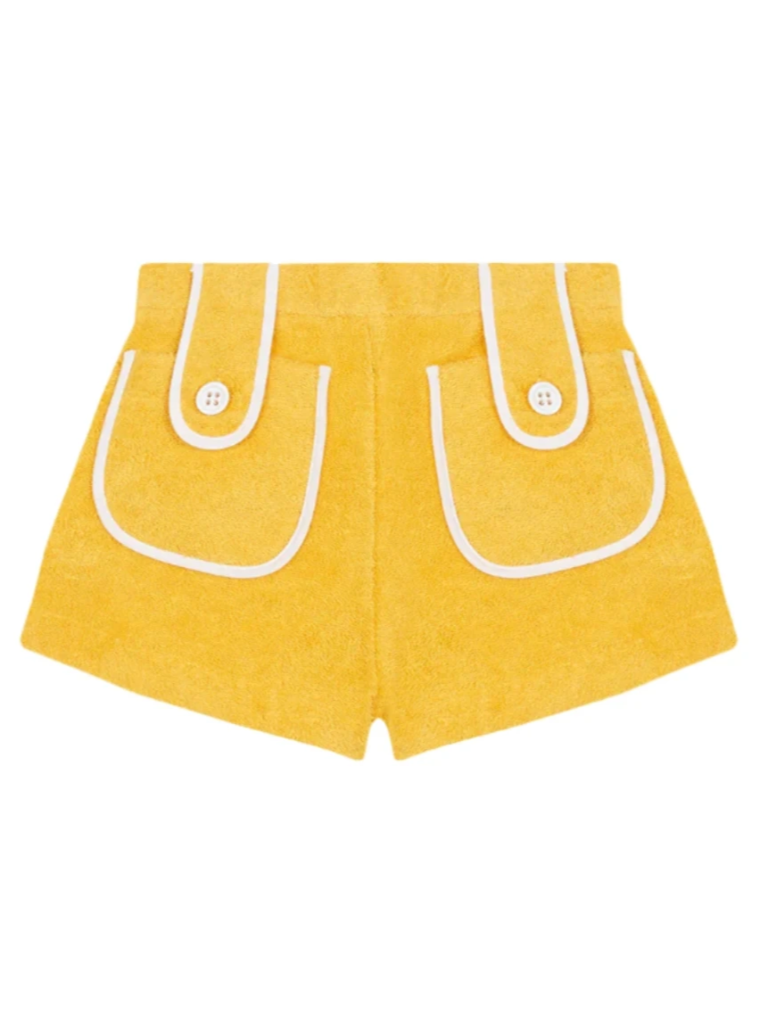 Yellow towel shorts with white-trimmed U-shaped pockets and buttoned straps