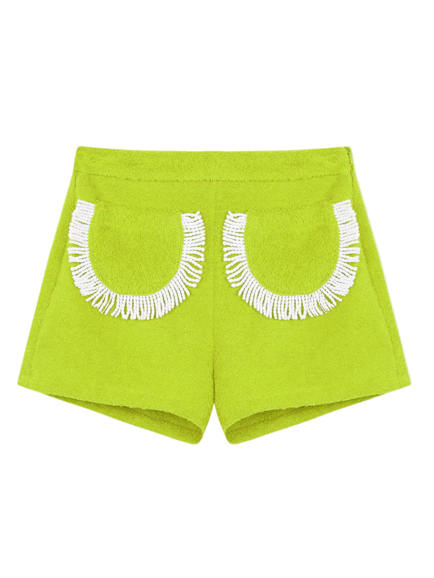 Lime green fringed shorts with white crescent embroidery on front