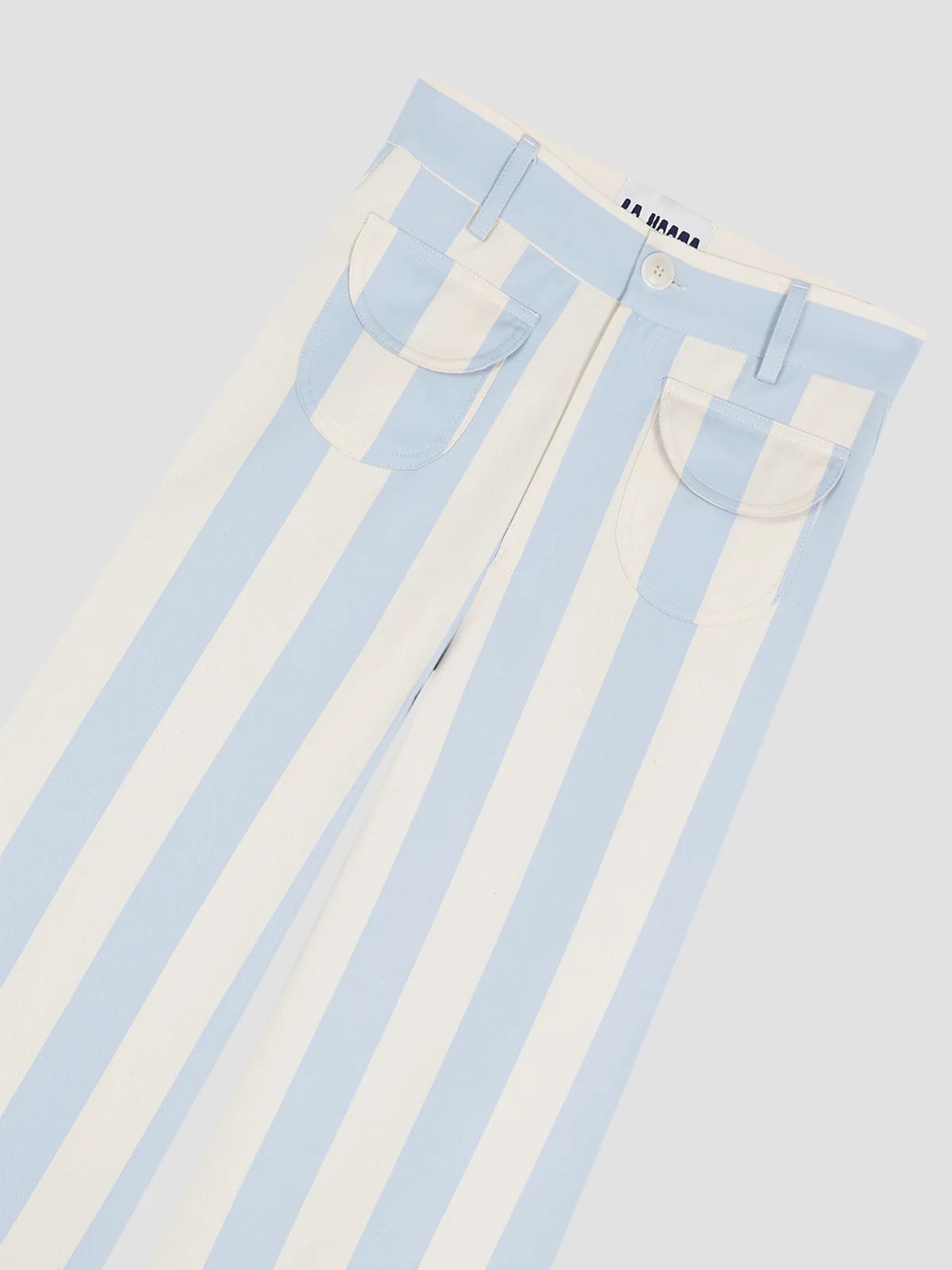 La Veste Parasol pants waistband detail, button front, light blue/white stripes