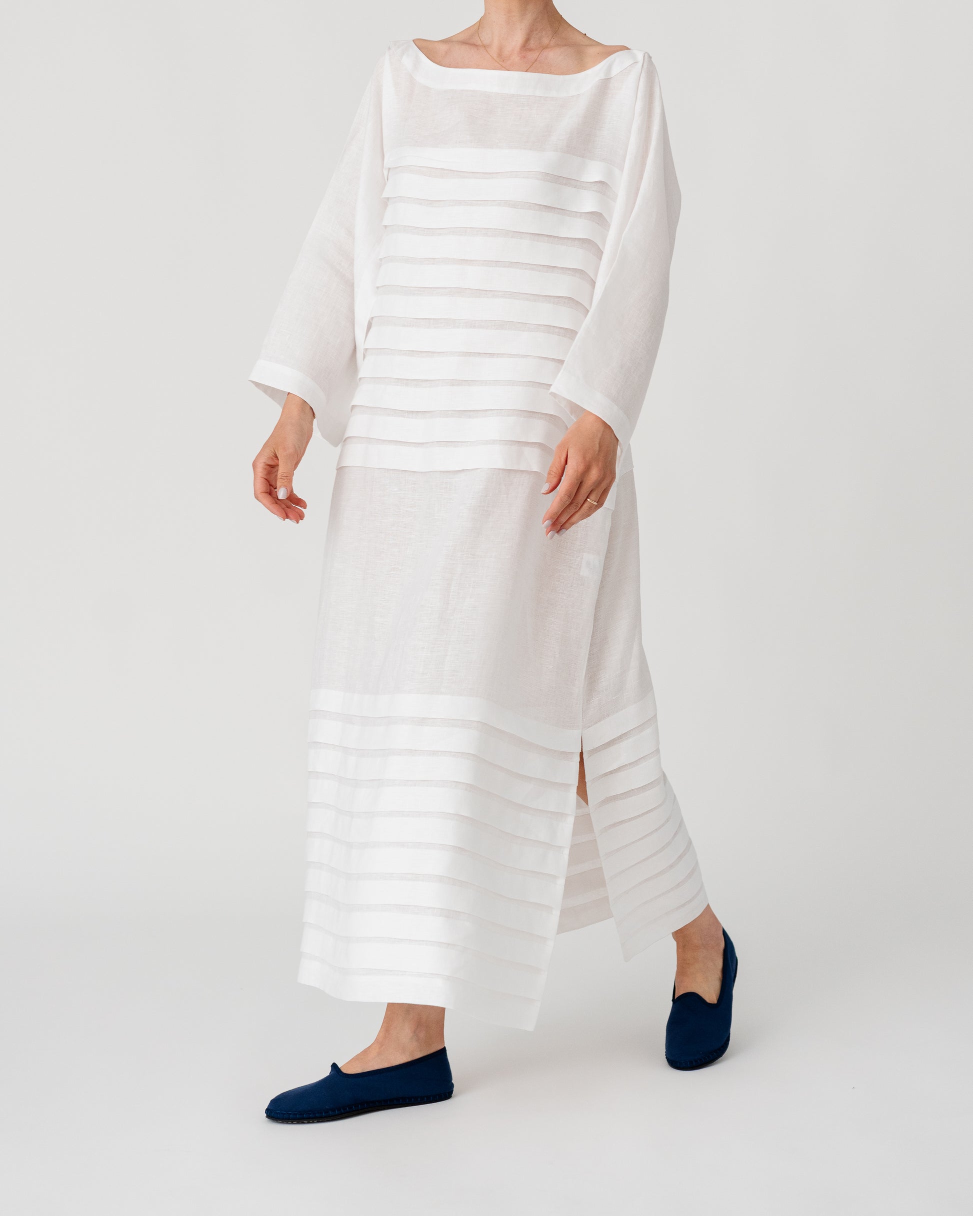 Light white maxi dress with horizontal stripe bands and side hem slit