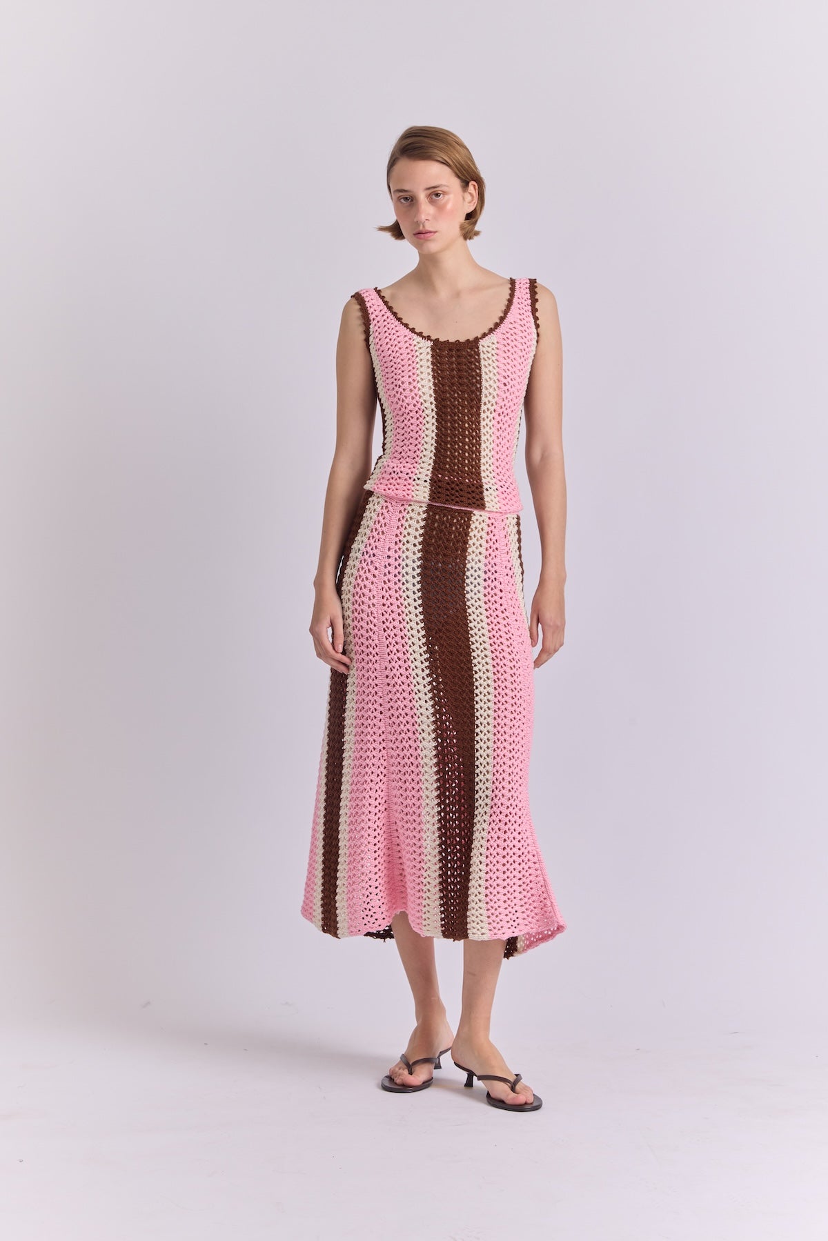 Pink and cream striped midi knit skirt with scalloped hem and fitted waistband