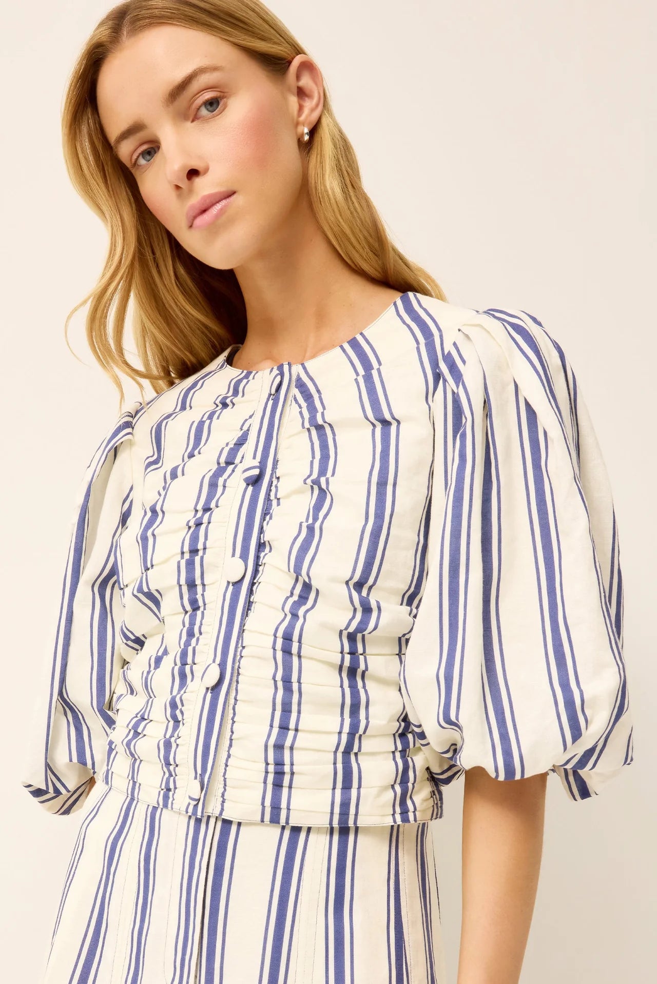 Striped sailor blouse with blue lines, front buttons and voluminous puff sleeves