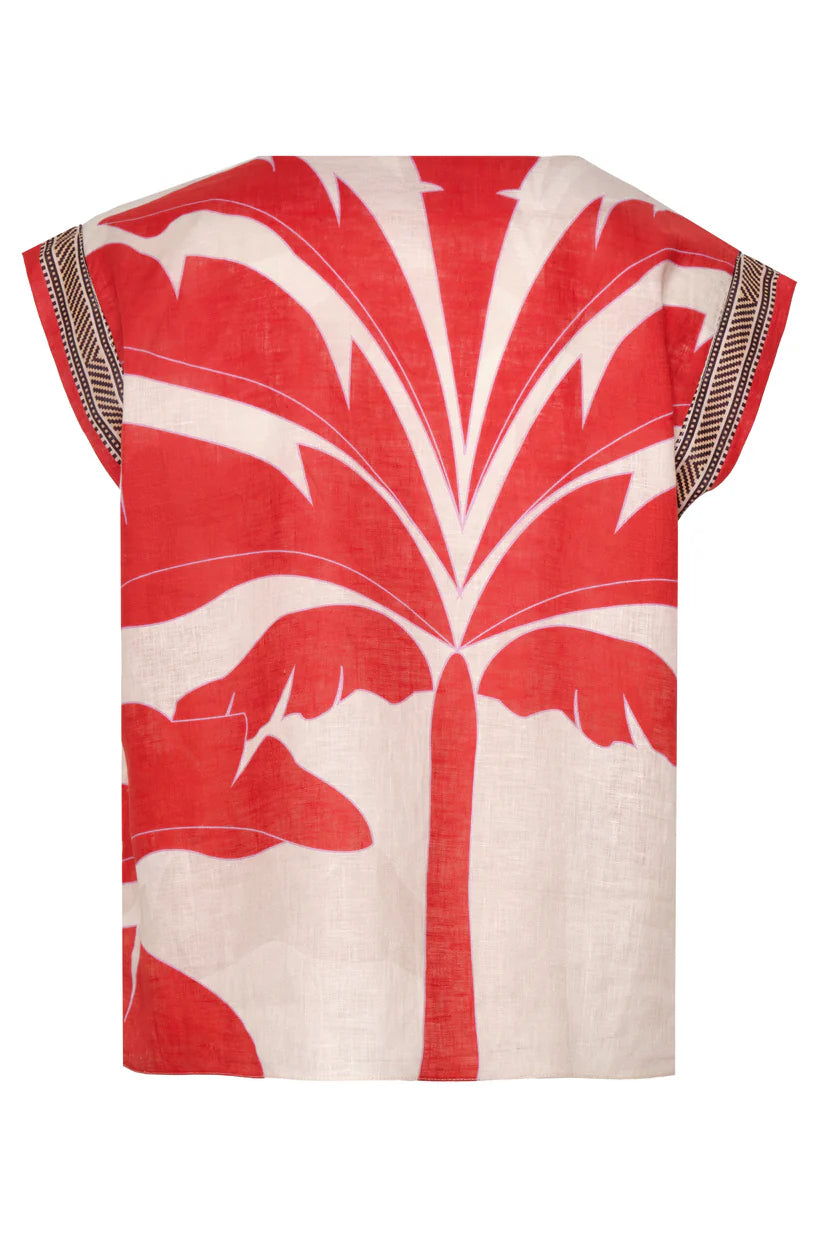Sleeveless linen top with red and cream palm print, back view, patterned trim