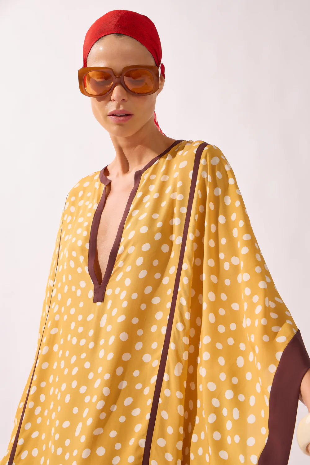 Polka dot maxi kaftan neckline and shoulders, V-neck with dark trim and draped sleeves