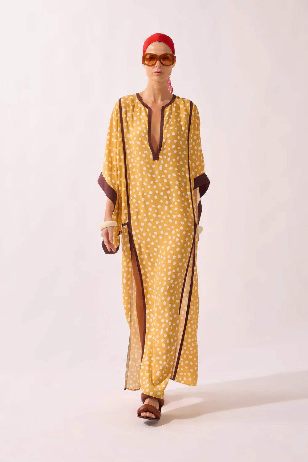 Yellow polka dot maxi kaftan with V-neck and dark trim, ankle-length relaxed silhouette