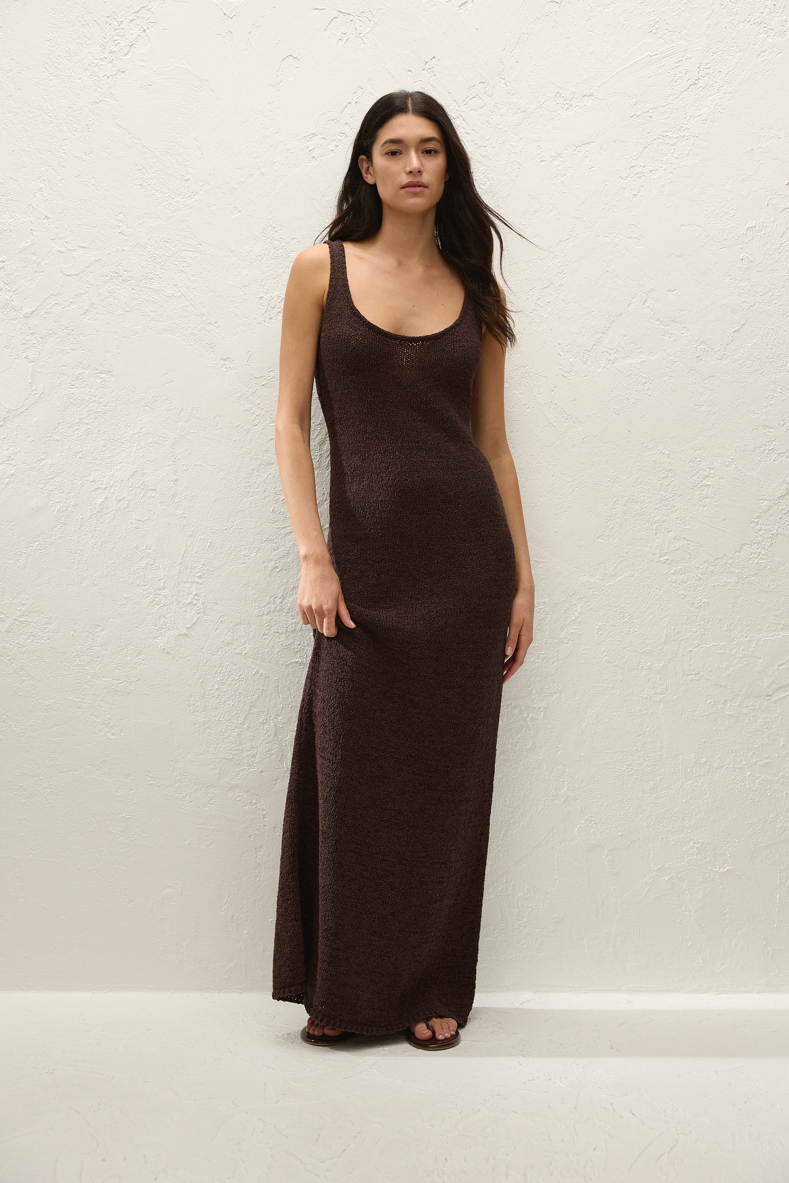 Dark brown sleeveless maxi dress with scoop neckline and straight maxi hem