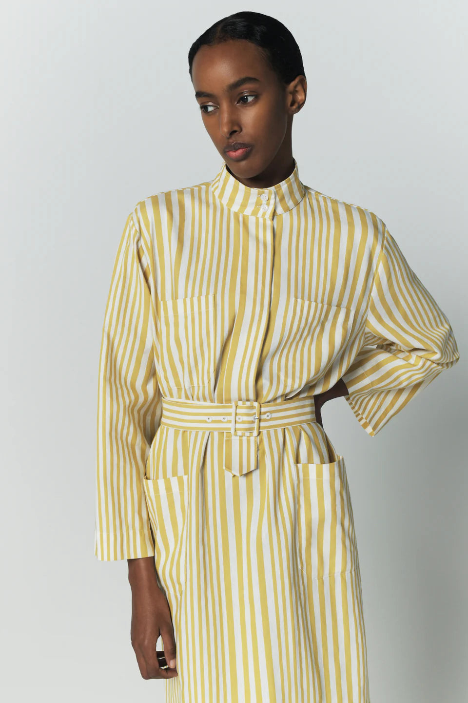 Yellow striped belted midi dress with buttoned stand collar and tied waist belt