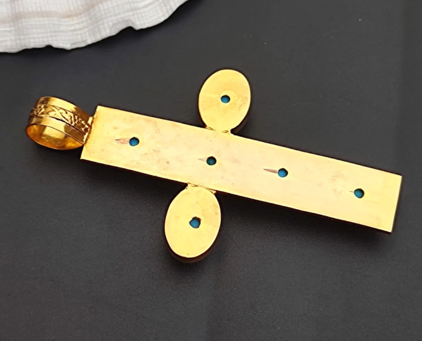 Gold-tone cross pendant back with round turquoise-inlay holes