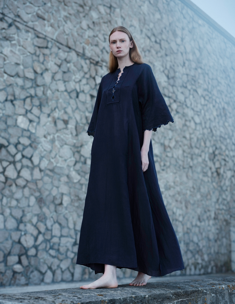 Dark navy long kaftan with scalloped trim at cuffs and neckline