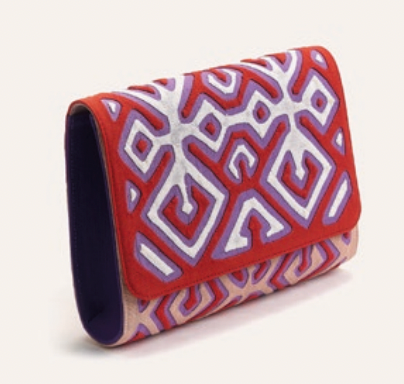 Oguala clutch with red geometric outer and dark navy fabric lining, side view