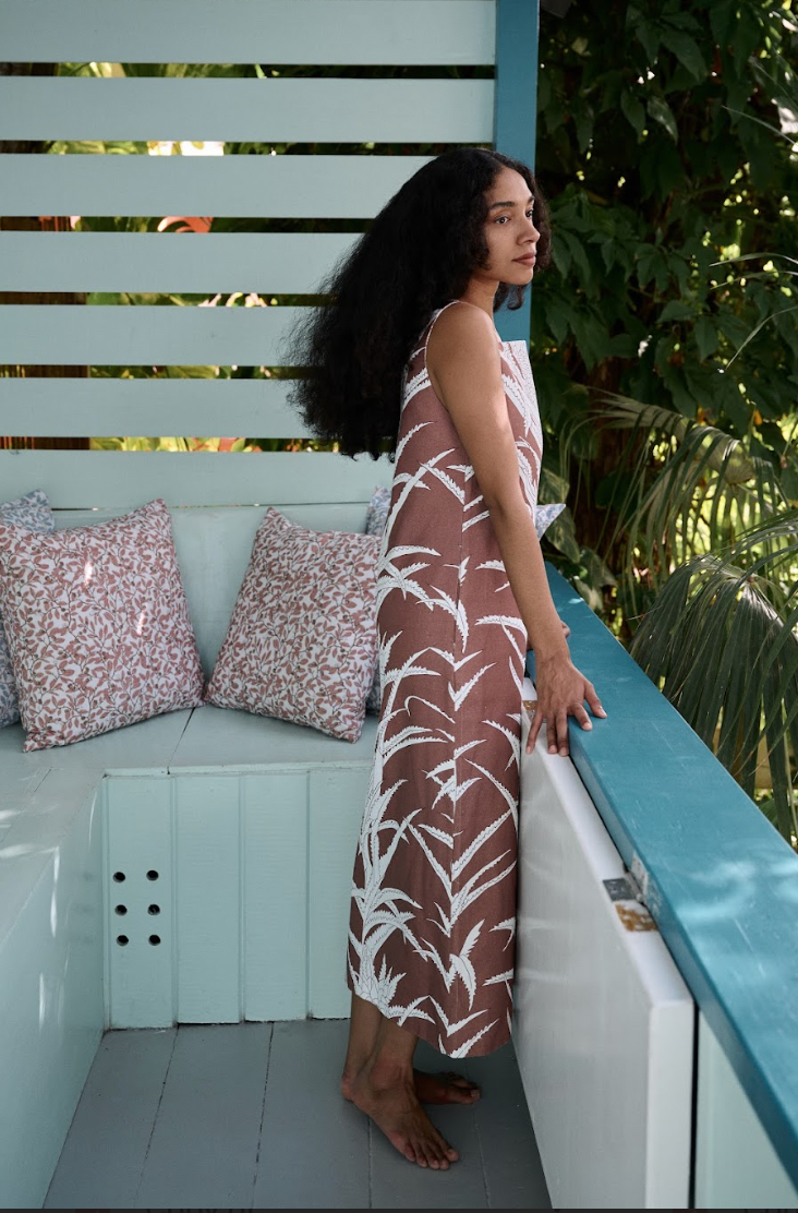 Brown shift dress sleeveless, white leaf and flower print, side view