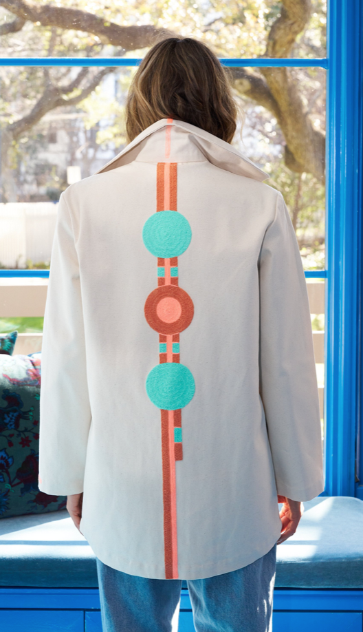 Rock Pool jacket, light cream with colorful geometric tree print on back