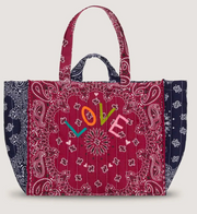 Quilted cabas tote bag in burgundy and navy with patterned patchwork and LOVE on handles.