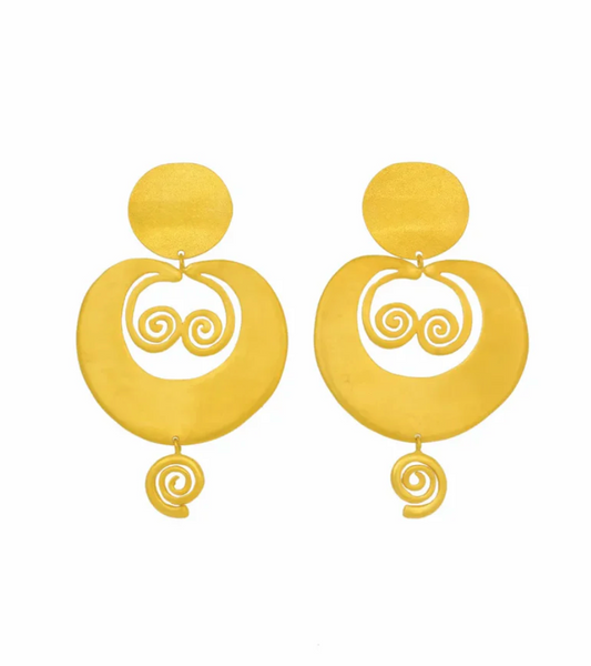 Pair of gold earrings with spiral designs on a white background