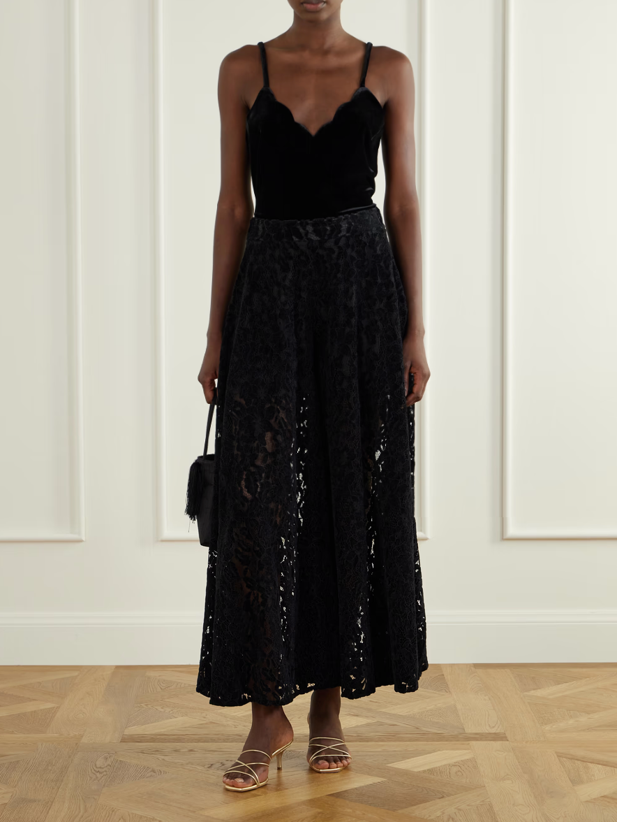 High-waisted black lace midi skirt, flared A-line silhouette