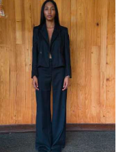 Dark tuxedo blazer with satin-like notch lapels and long sleeves