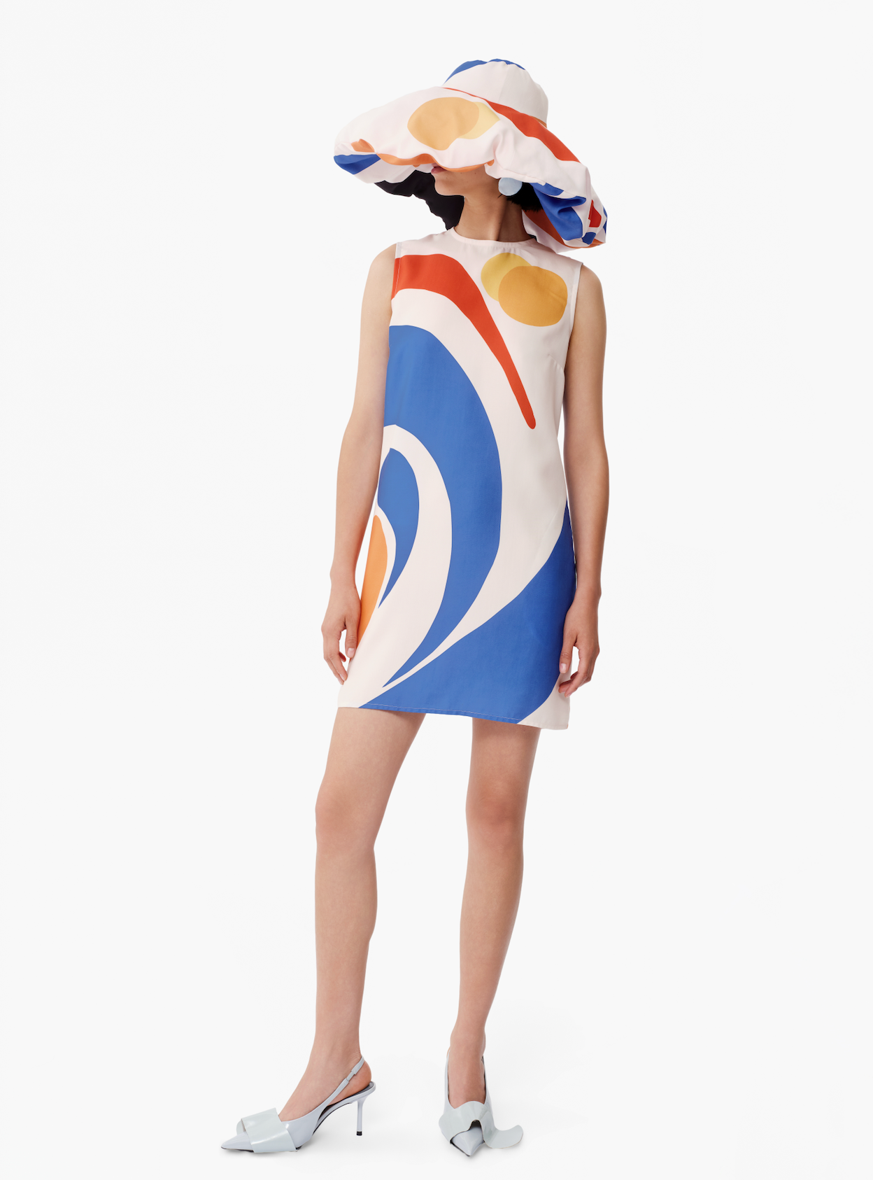 Sleeveless shift dress, back view, abstract blue, red, orange and yellow print